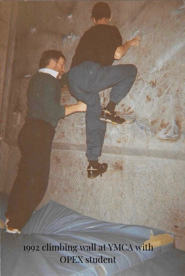 An OPEX student scaling the YMCAs climbing wall (1992)