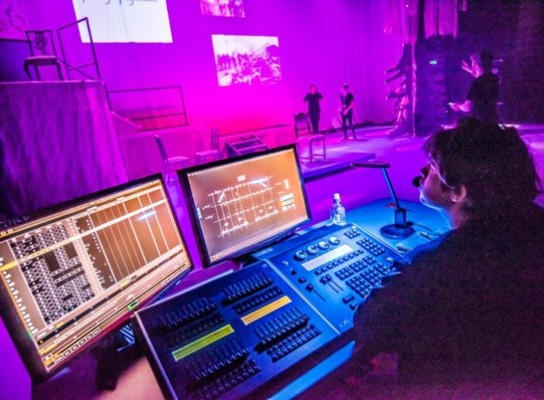 Student Working the Lights for a Stage Production